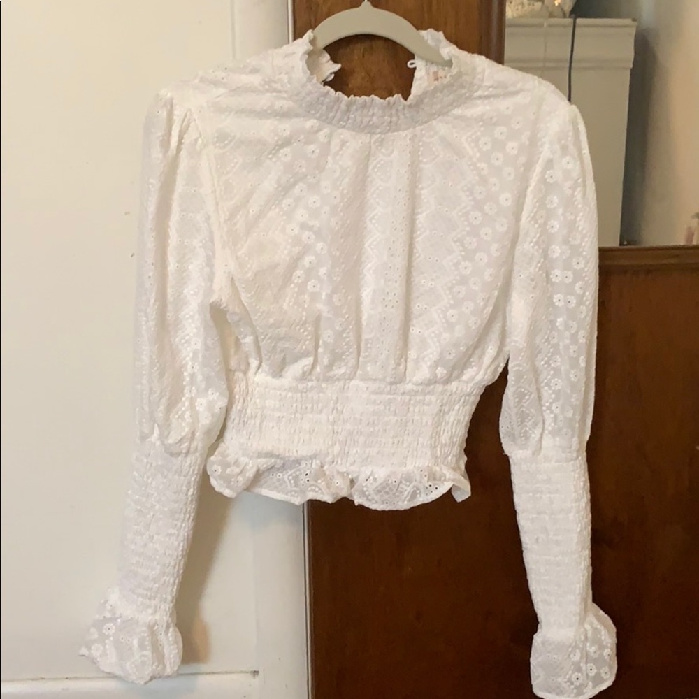 Beautiful white lace look top with amazing detail